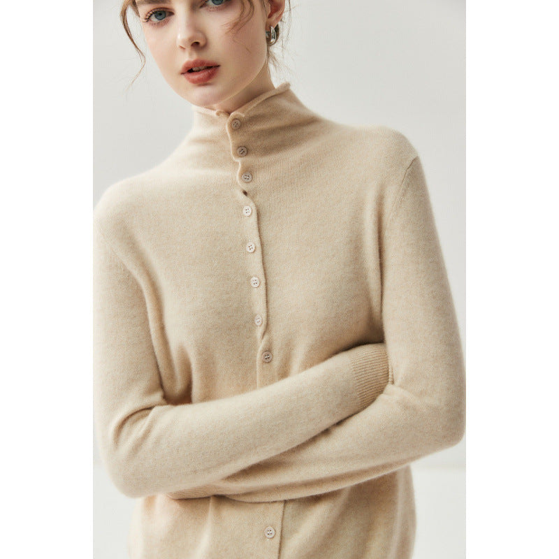 Elegant camel reversible cardigan, arms crossed