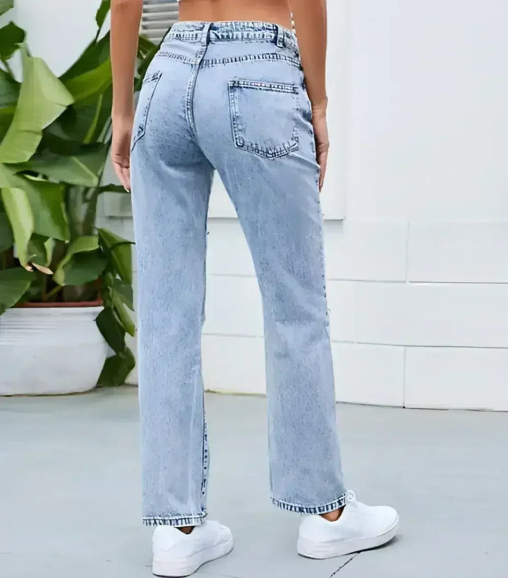 Women’s light blue straight-leg jeans back view showing relaxed fit and clean washed denim finish
