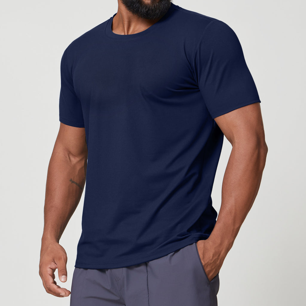 Man wearing navy blue dri-fit moisture-wicking gym shirt, front view