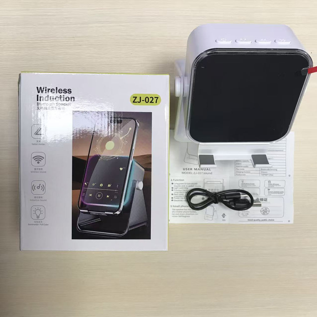 Wireless induction speaker phone stand with rotating adjustable holder