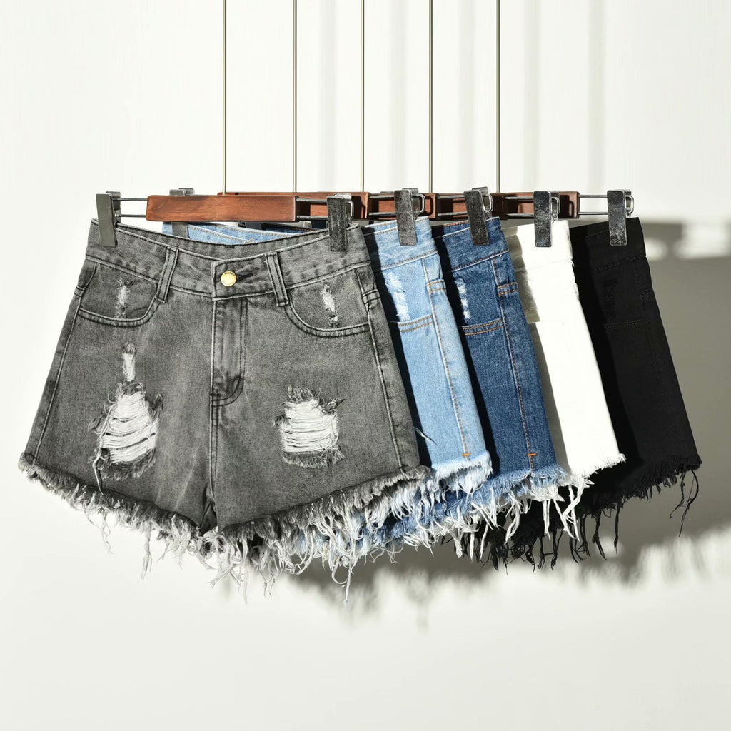  High waisted ripped denim shorts women in grey, blue, white, and black colors hanging together with frayed hems
