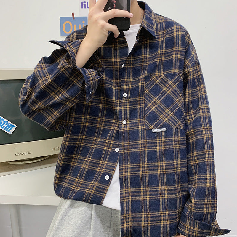 Men's navy blue and tan plaid flannel shacket with chest pocket, loose fit long sleeve