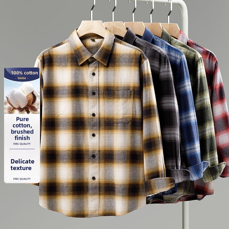 Men's plaid flannel shirt collection on hangers in black, blue, green, and red plaid