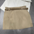 Khaki a-line mini skirt with belt, front view