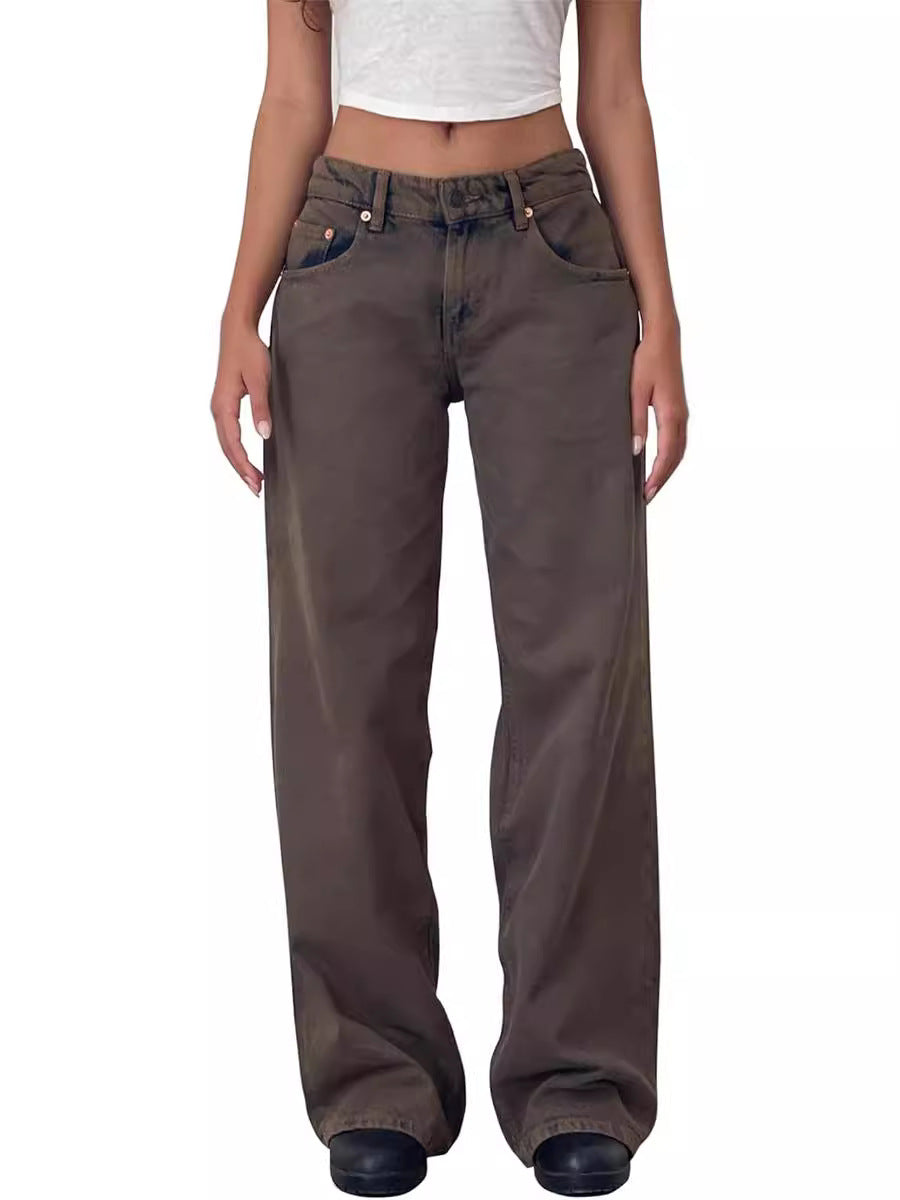 Woman in high-waisted dark brown straight-leg wide-leg jeans and white top, front view.