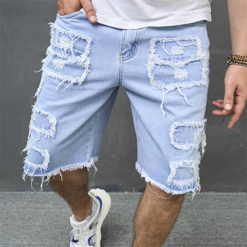 Men's Y2K denim shorts full length, on-model streetwear styling