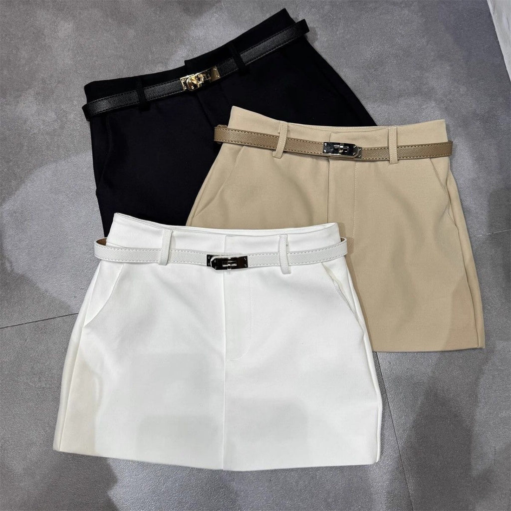 High waisted mini skirts in khaki, white, and black with belt