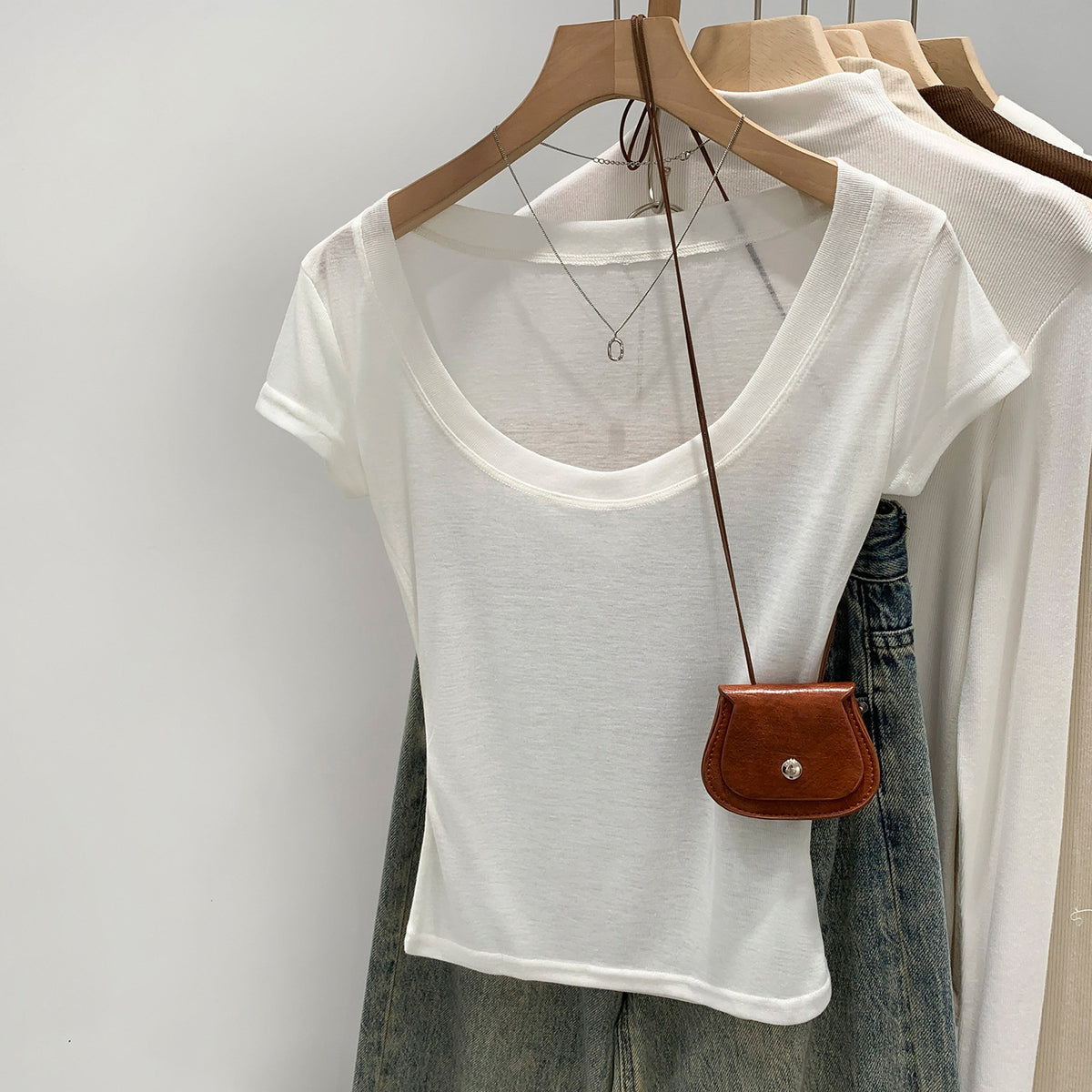 Off-white women's scoop neck t-shirt, casual everyday styling