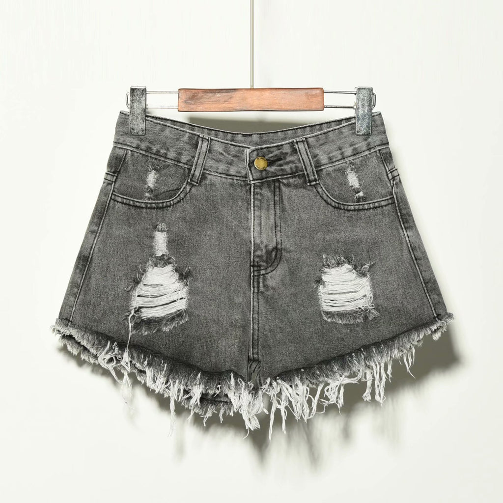 Grey high waisted ripped denim shorts women featuring A-line fit and frayed edges on wooden hanger