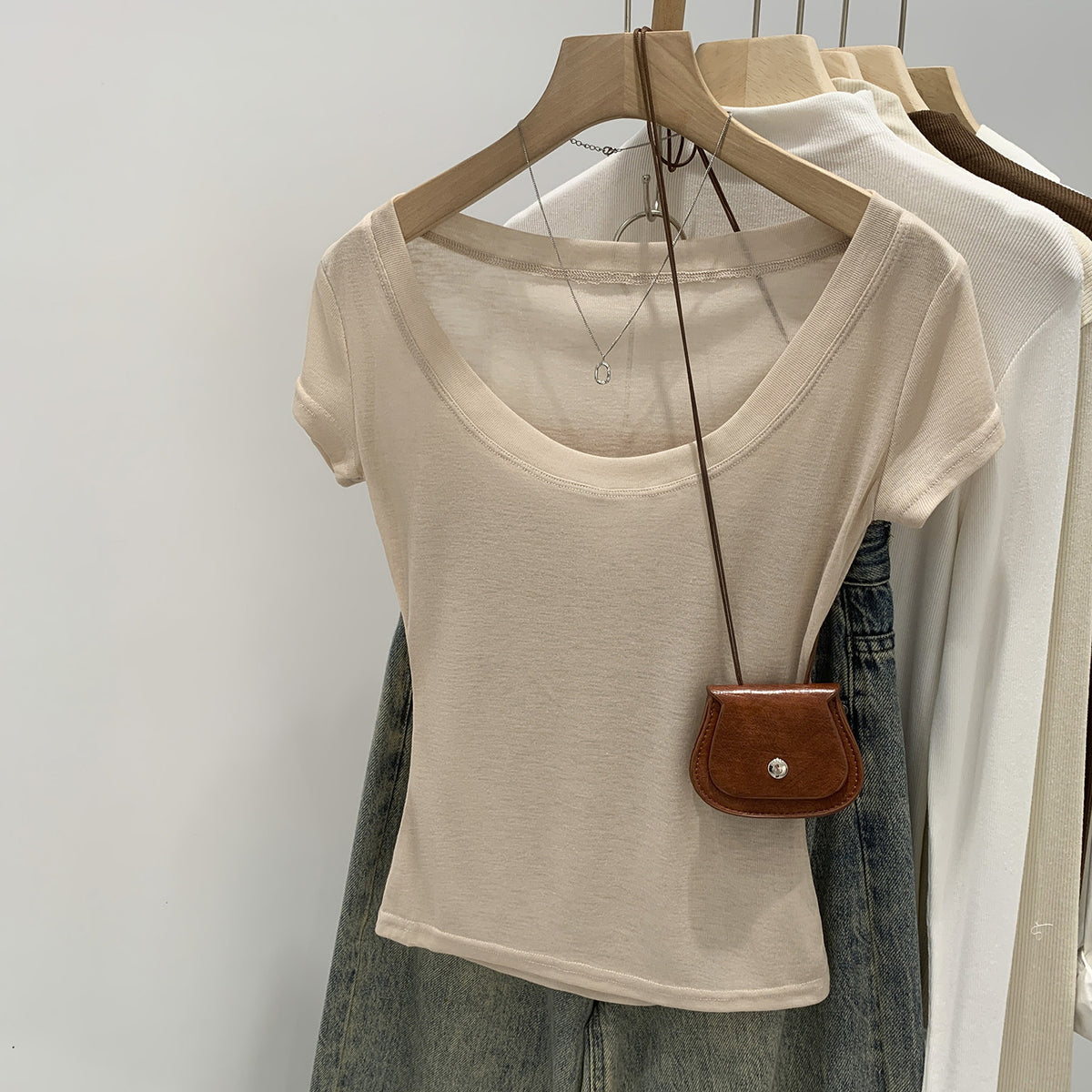 Orange pink women's scoop neck t-shirt, front flat lay