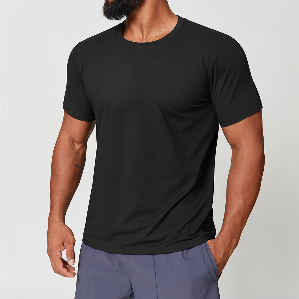 Man wearing premium black dri-fit gym shirt, front view