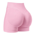 Pink yoga biker shorts butt lifting close up