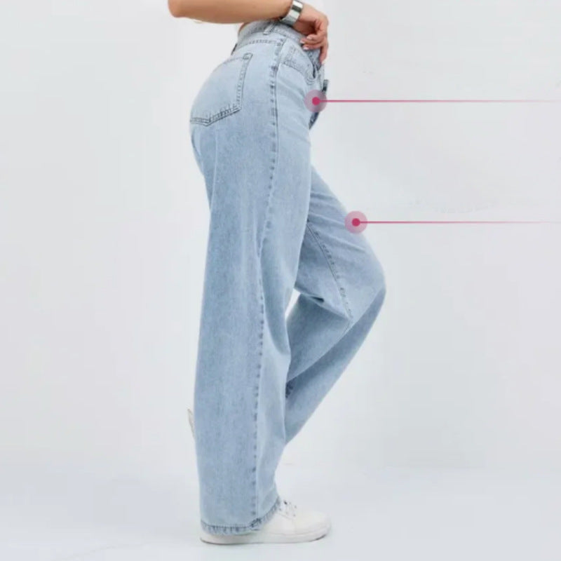 Woman modeling light wash wide leg jeans