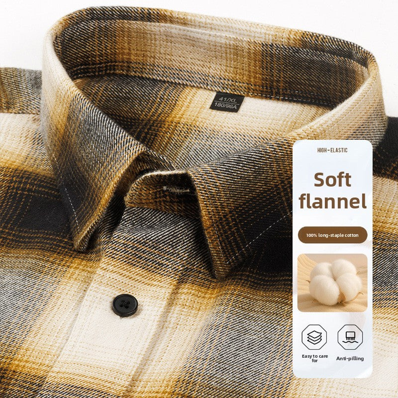 Brown and yellow plaid flannel shirt collar and button close-up, front view