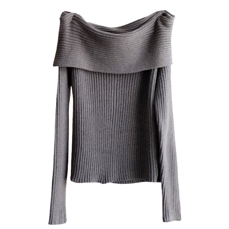 Flat lay of dark gray ribbed knit fold over off the shoulder sweater with long sleeves
