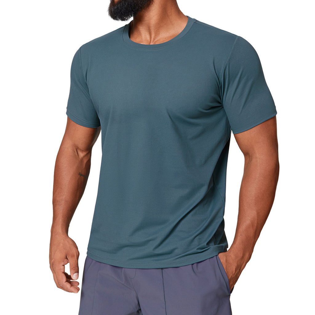 Man wearing dark teal dri-fit gym shirt for men, front view