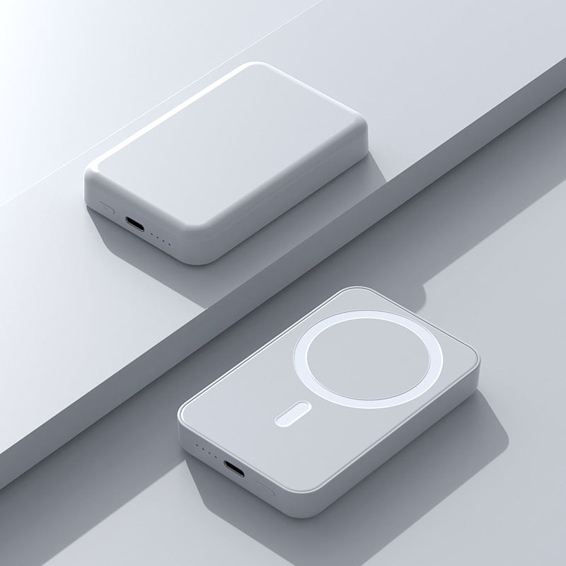 Gray magnetic power bank angled view with LED display button