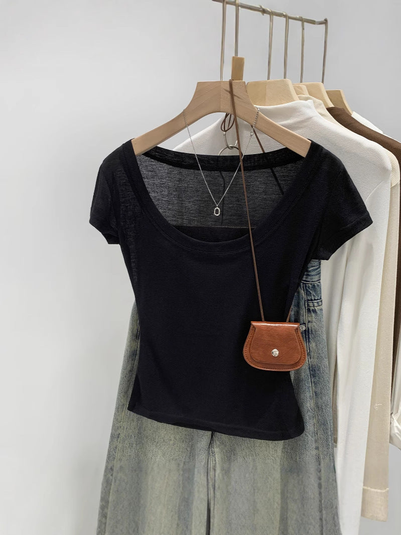 Black women's scoop neck t-shirt, fabric and stitching detail