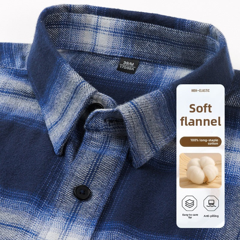 Blue plaid flannel shirt collar and button close-up, detail view