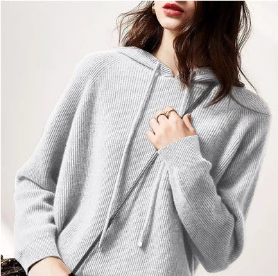 Flat lay of women's creamy-white cashmere blend hooded sweater, folded — detail 2
