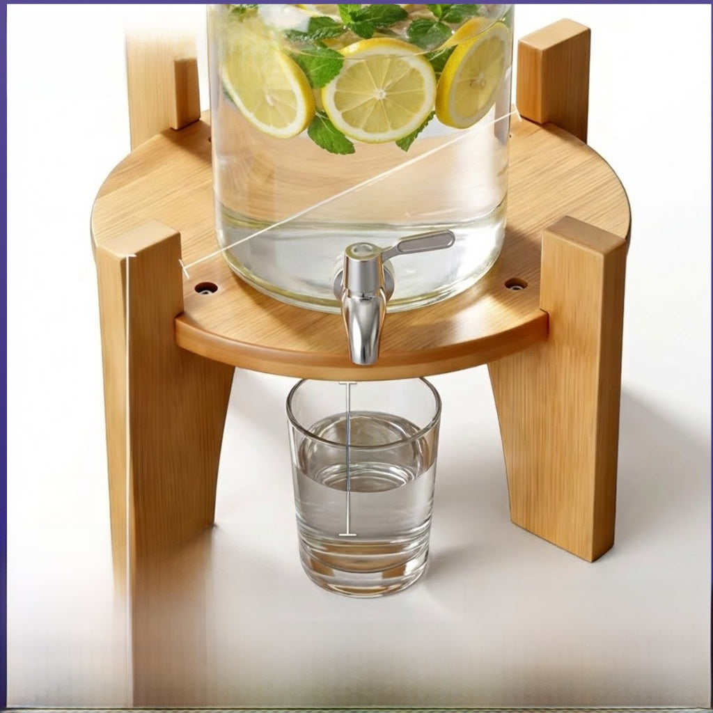 Close-up of a bamboo beverage dispenser holder with a glass placed under the dispenser spigot